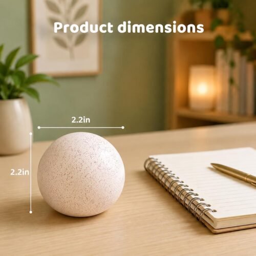 NeeDoh Snowball – slow rebound squish toy (6/6) NeeDoh Snowball pink stress ball on a desk — Image 6 of 6