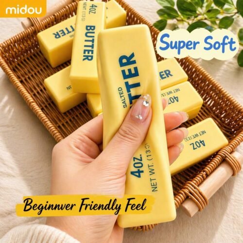 NeeDoh Butter Squishy realistic slow-rise butter stick toy in hand — Image 5 of 12